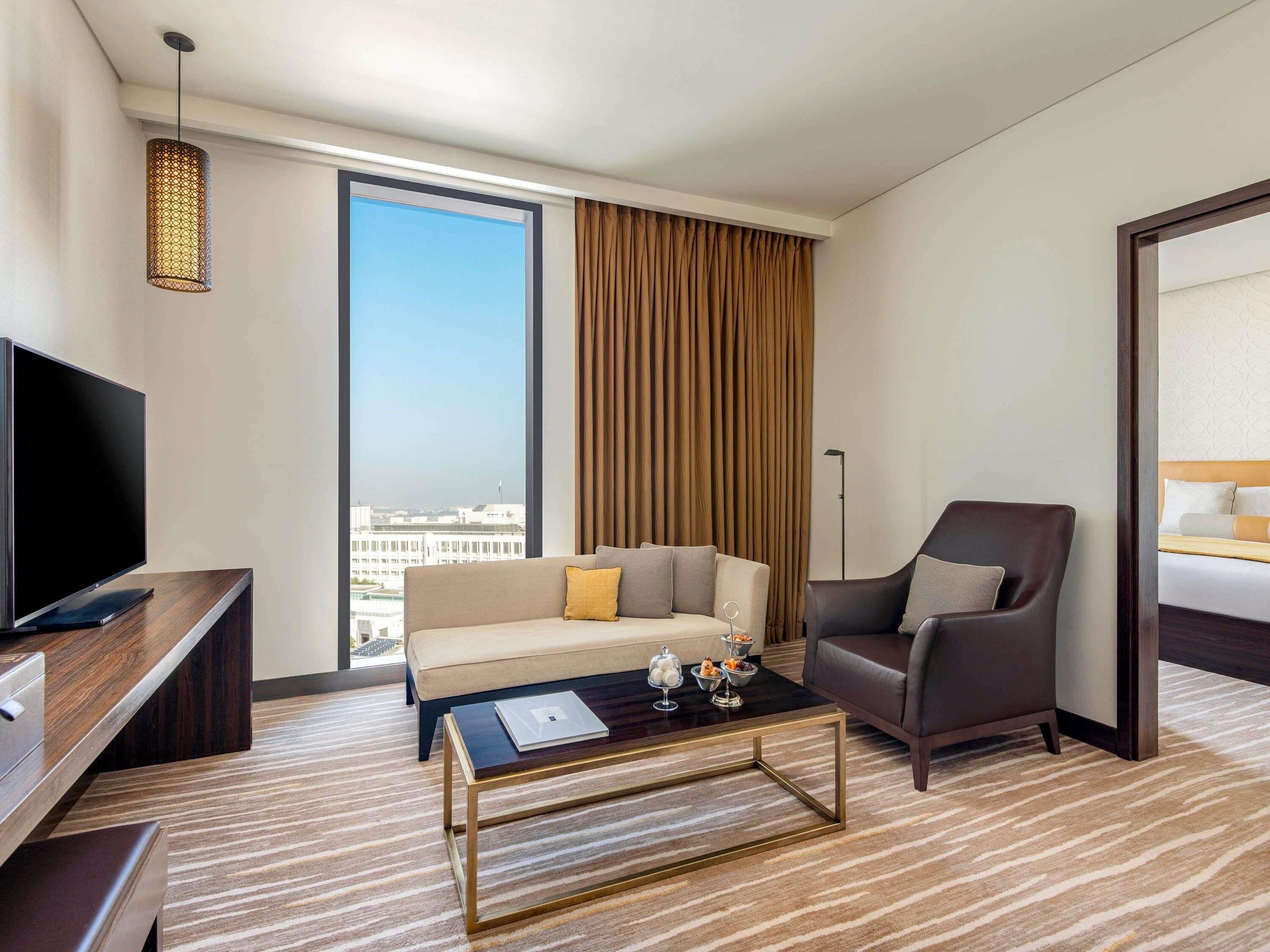 Deluxe Suite, 1 Bedroom (1 King Size Bed and Living Area) | Premium bedding, minibar, in-room safe, desk