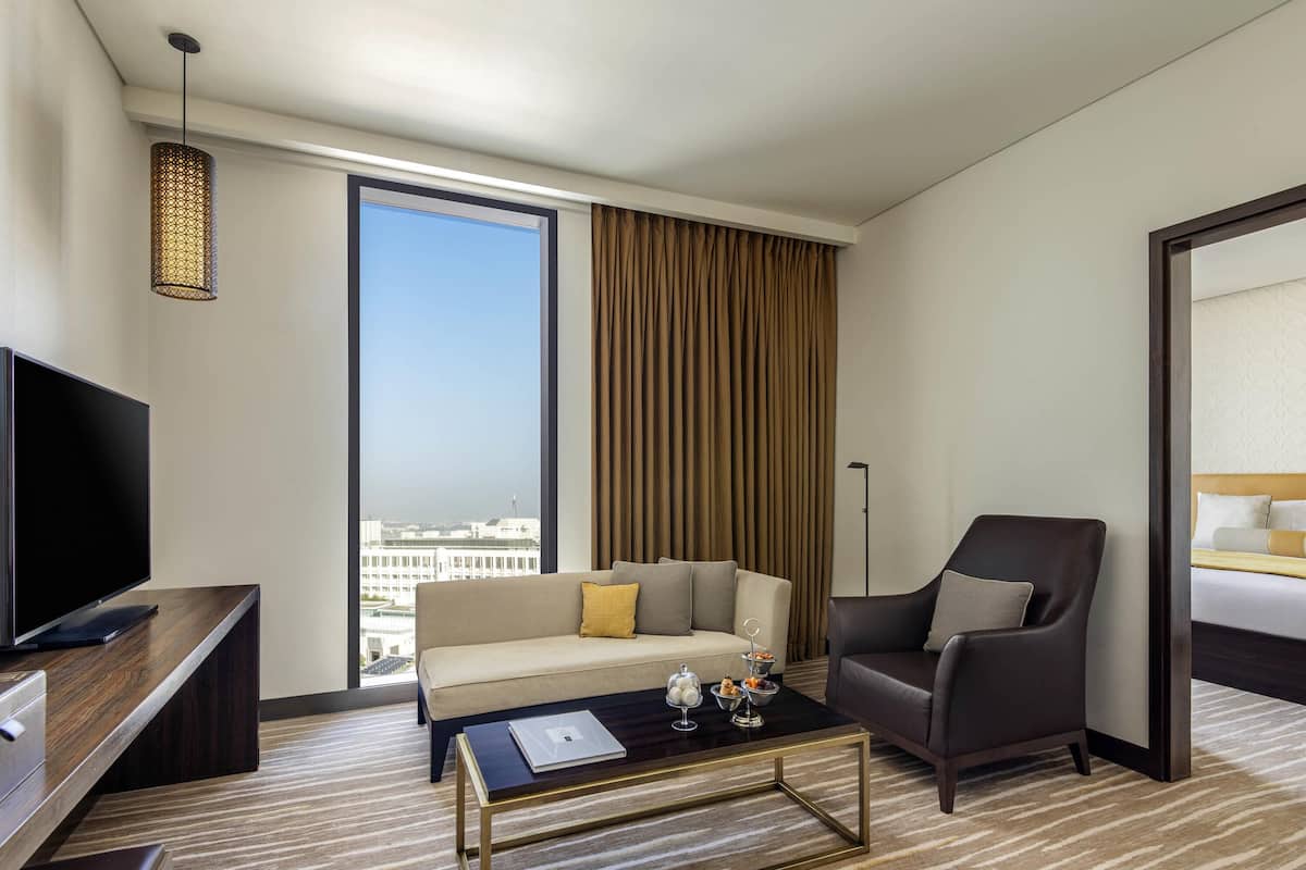 Suite Deluxe, 1 habitación (1 King Size Bed and Living Area) | Ropa de cama de alta calidad y minibar