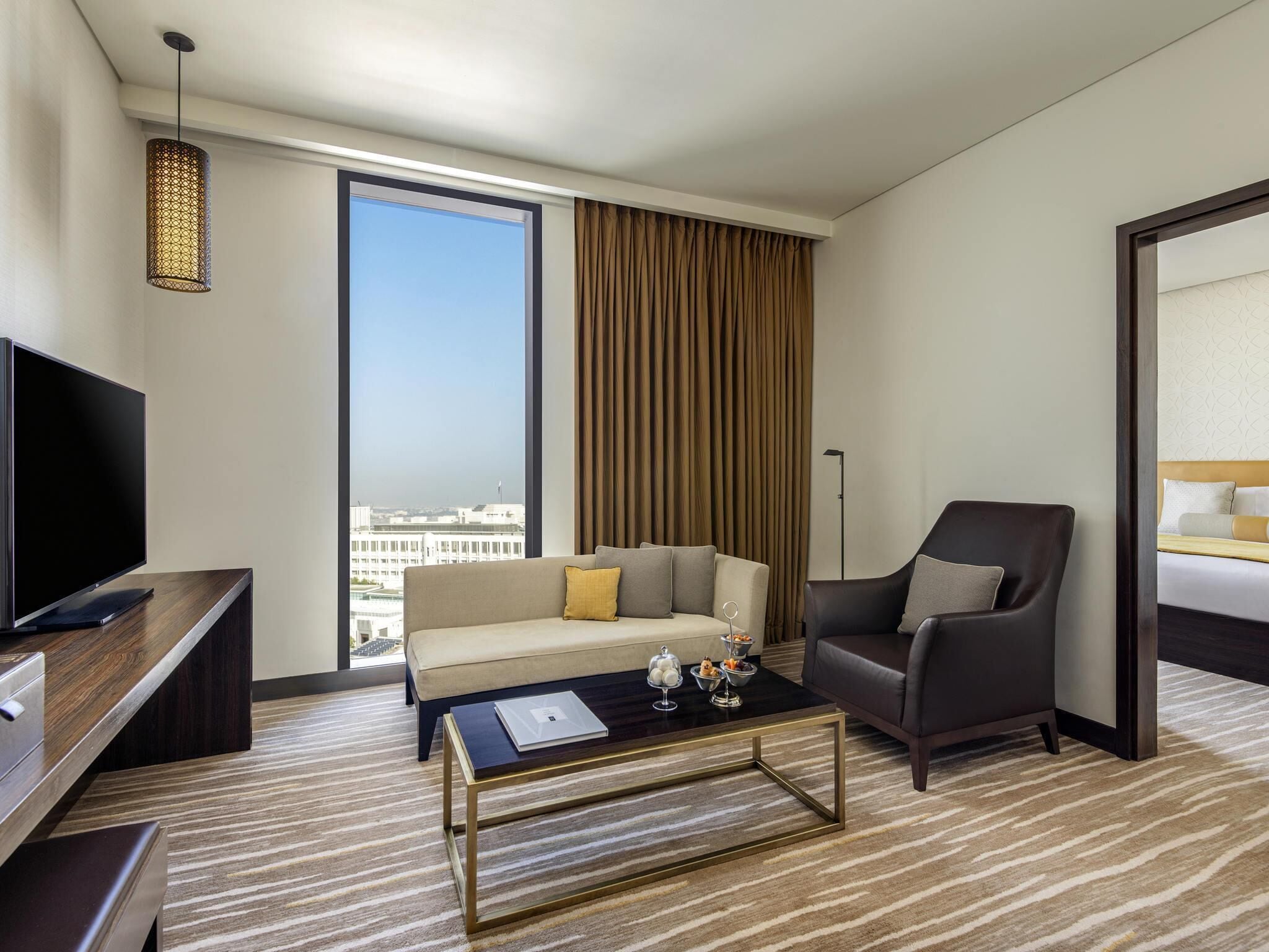 Deluxe Suite, 1 Bedroom (1 King Size Bed and Living Area) | Premium bedding, minibar, in-room safe, individually decorated