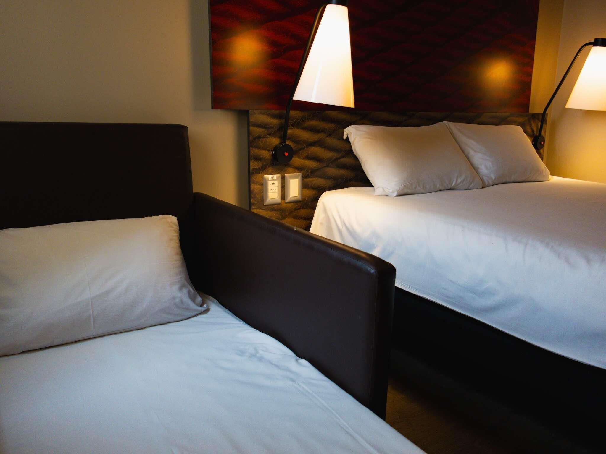 Standard Room, Multiple Beds | In-room safe, desk, soundproofing, free WiFi