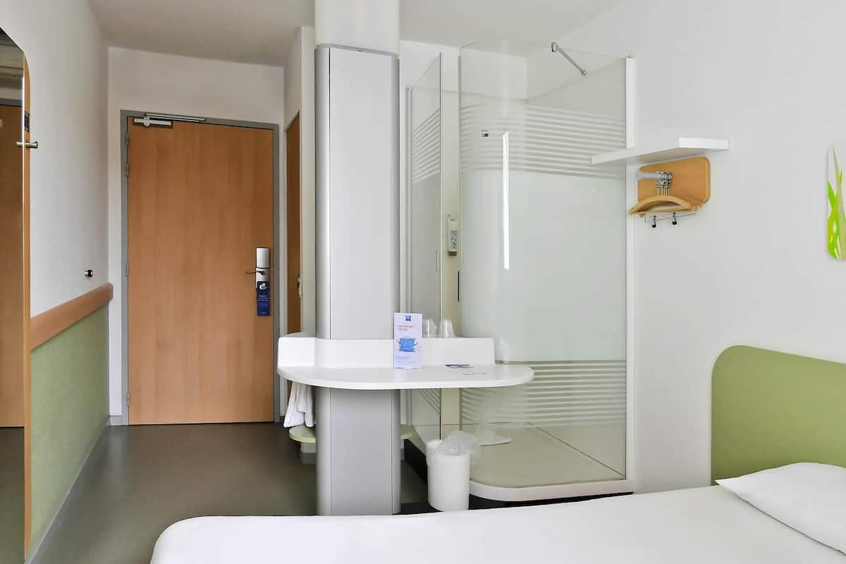 Desk, blackout drapes, soundproofing, iron/ironing board