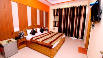 Deluxe A/c | Ropa de cama de alta calidad, caja fuerte, sistema de insonorización