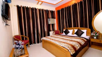 Deluxe A/c | Premium bedding, in-room safe, soundproofing, free WiFi