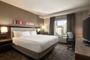 Coffres-forts dans les chambres, bureau, fer et planche à repasser