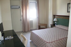 Desk, free WiFi, bed sheets