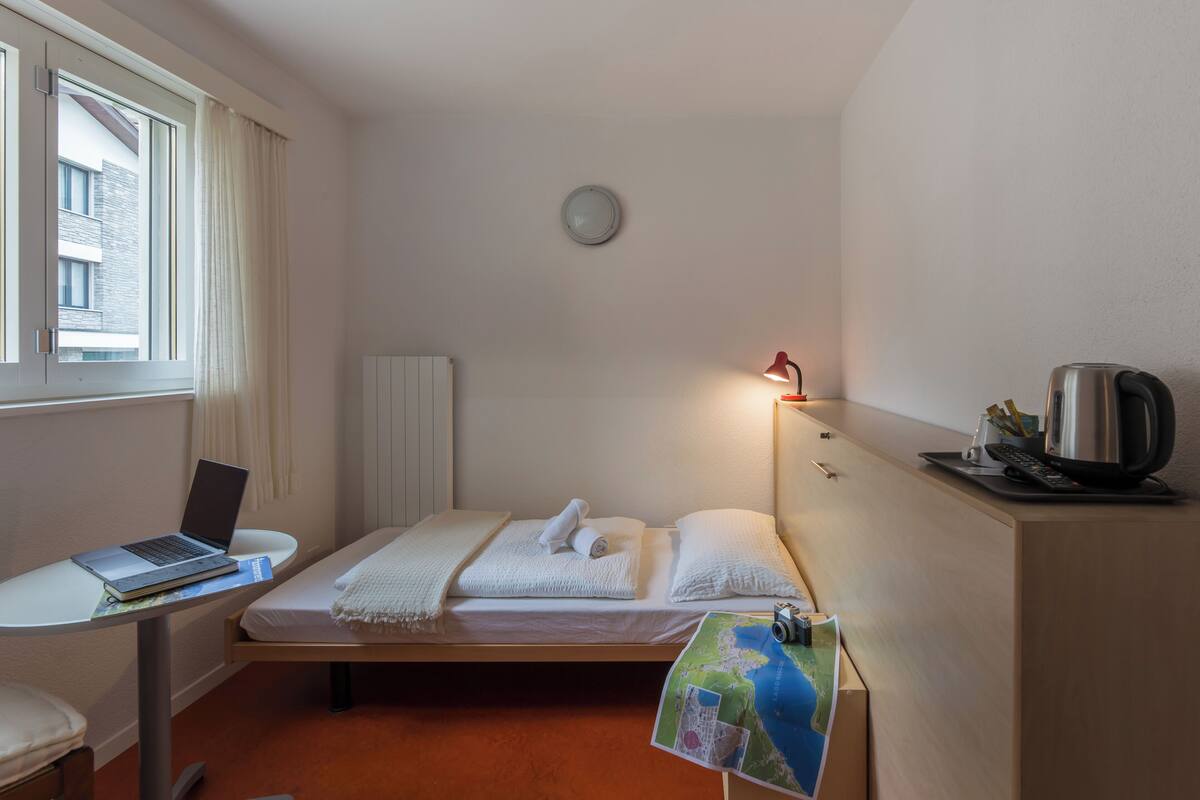1 bedroom, premium bedding, down comforters, soundproofing