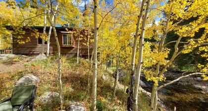 Simple mountain cabin on the banks of the mighty Saint Vrain Creek