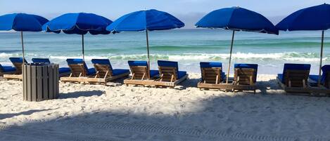 On the beach, sun loungers