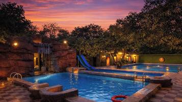 Outdoor pool, pool umbrellas, pool loungers