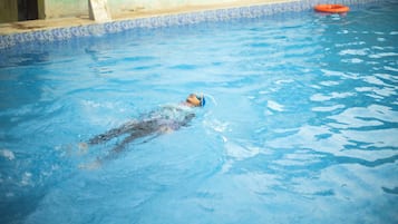 Outdoor pool, pool umbrellas, sun loungers
