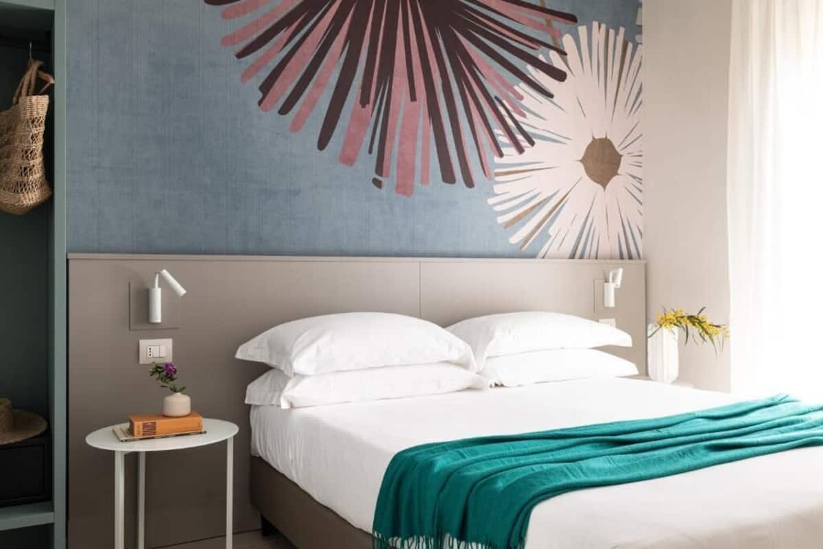 Chambre Quadruple Confort, vue mer | Coffres-forts dans les chambres, bureau, rideaux occultants