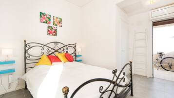 Apartment, 1 Bedroom | 1 bedroom, desk, blackout drapes, iron/ironing board