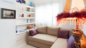 Apartment, 1 Bedroom | Living area | Flat-screen TV