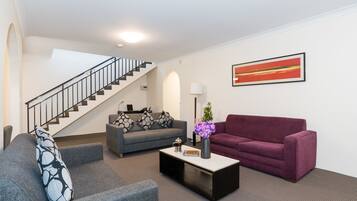 Townhome, 3 Bedrooms | Living area | Plasma TV