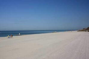 On the beach, beach towels - PRIVACY, RELAX with the DOLPHINS at the SEASIDE,no people. LOUNGERS & UMBRELLA,  (Madeira Beach)
