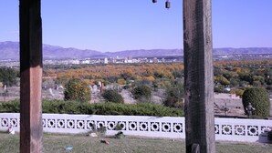 A gazebo with a view of a cityscape and mountains in the background. - Secure carport, amazing Views and Reviews!  Private suite with patio.  (Albuquerque)