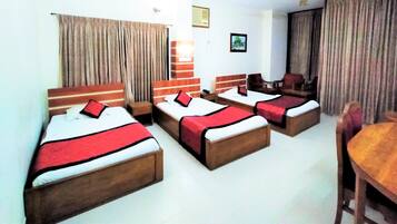 Deluxe Triple Room | 1 bedroom, minibar, in-room safe, individually furnished