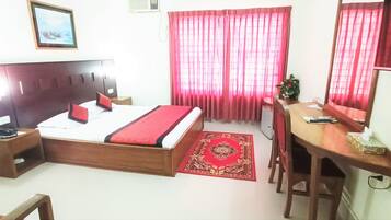 Deluxe Double Room, 1 Queen Bed, City View | Minibar, in-room safe, individually furnished, desk