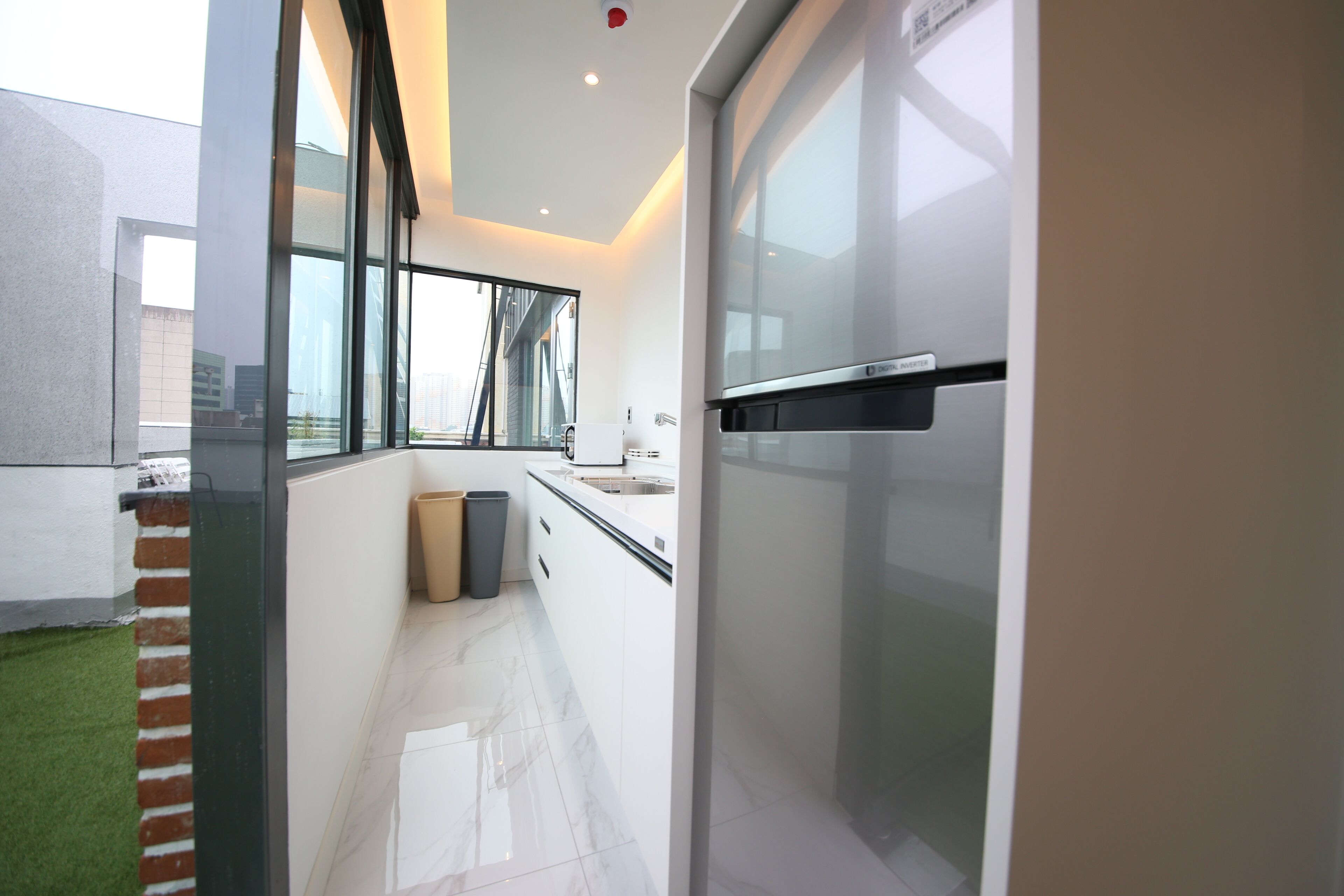 Rooftop Party Room | Down comforters, individually decorated, desk, blackout drapes