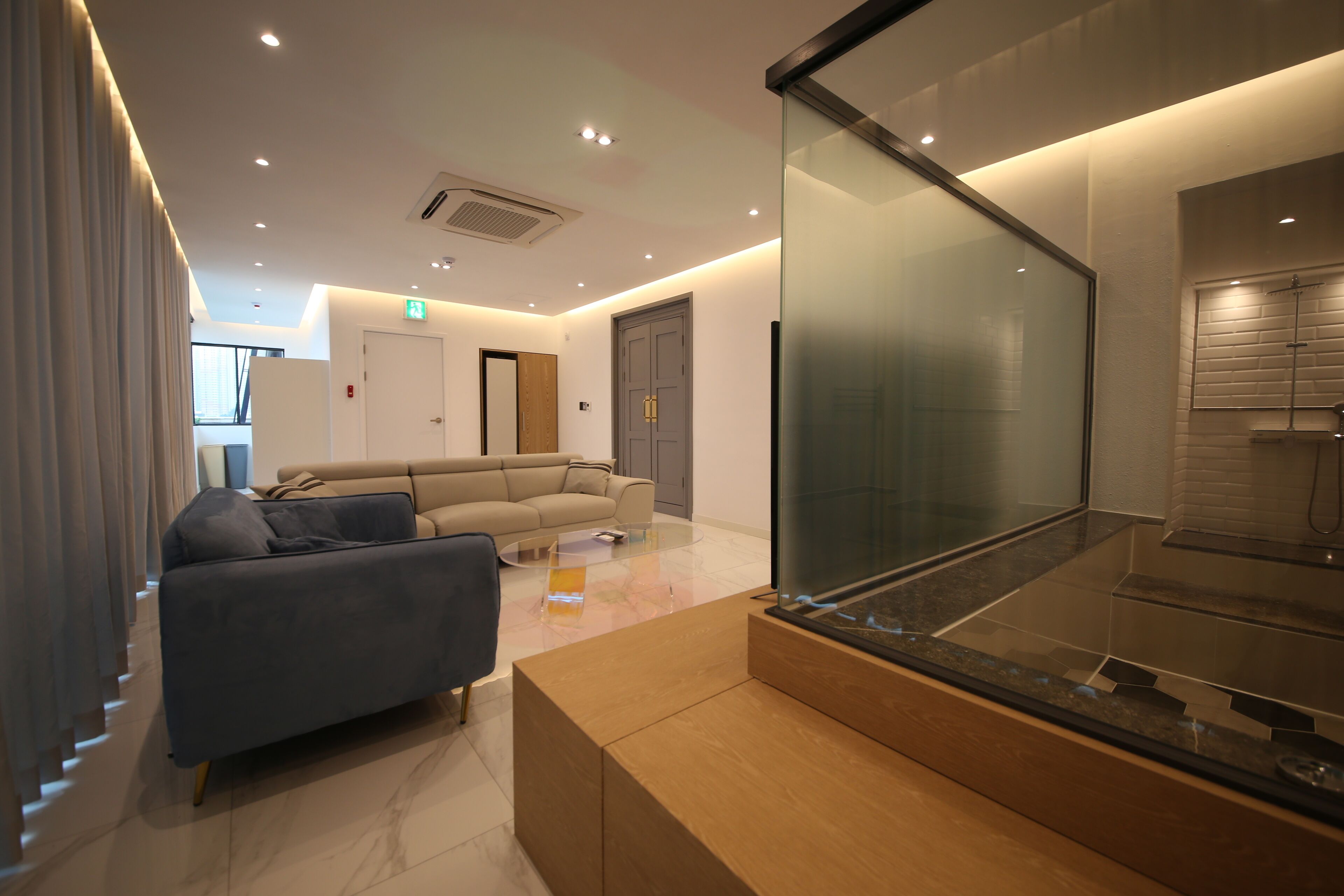 Rooftop Party Room | Down comforters, desk, blackout drapes, soundproofing