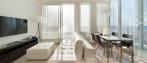 Apartment, 2 Bedrooms, Beach View | Living area | Flat-screen TV