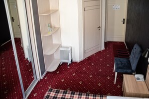 Blackout curtains, soundproofing, iron/ironing board, rollaway beds