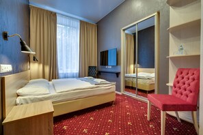 Blackout curtains, soundproofing, iron/ironing board, rollaway beds