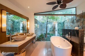 Villa, 1 Bedroom, Patio, Garden View | Bathroom | Combined shower/tub, designer toiletries, hair dryer, bathrobes