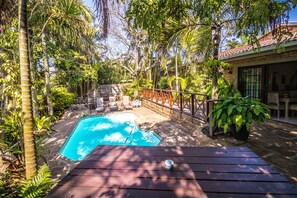 Outdoor pool, pool umbrellas, pool loungers