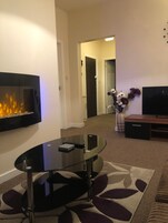 Family Apartment, 2 Bedrooms (Flat 5) | Living area | Flat-screen TV