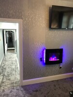 Apartment, 1 Bedroom (Flat 1) | Living area | Flat-screen TV