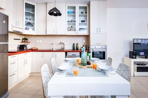 Apartment, 2 Bedrooms | Private kitchen | Full-size fridge, microwave, oven, stovetop