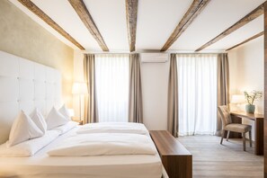 Suite júnior | Roba de llit hipoal ·lergògena i caixa forta a l'habitació 