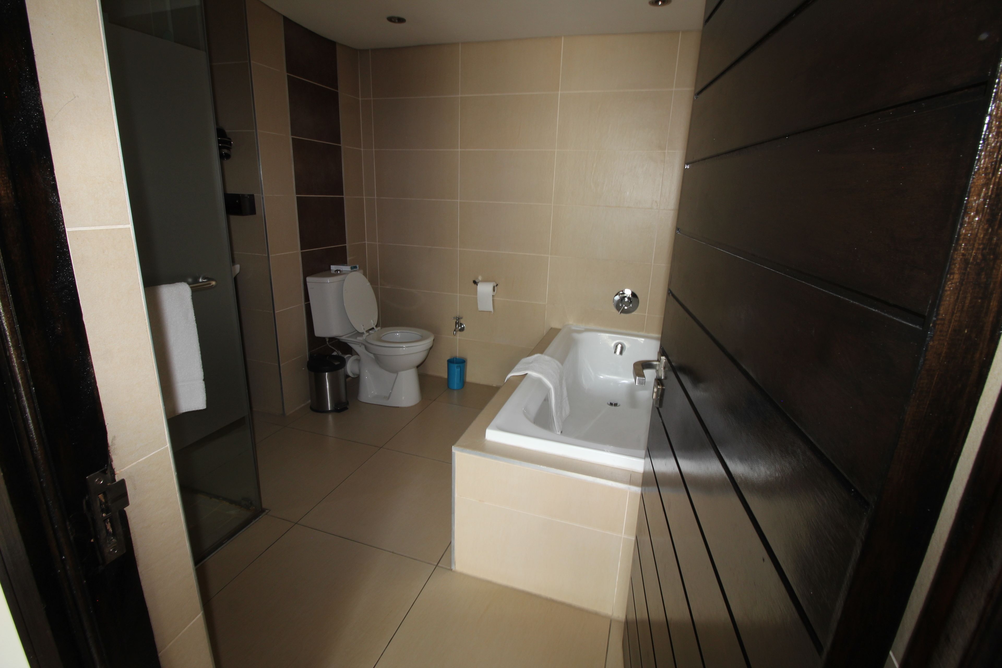 family suite, multiple beds | bathroom | deep-soaking bathtub, free toiletries, hair dryer, bathrobes