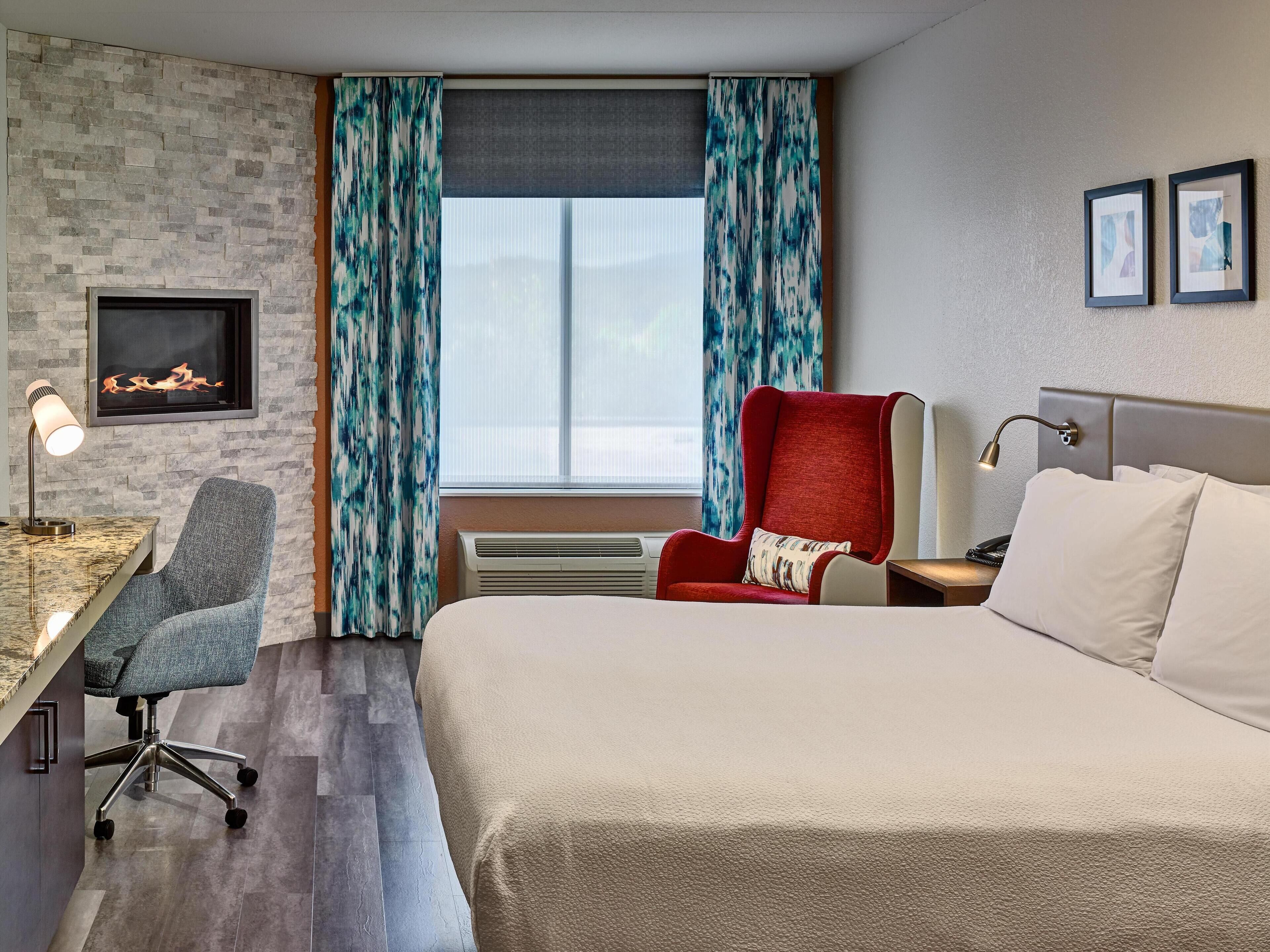 Chambre Deluxe, 1 très grand lit, cheminée