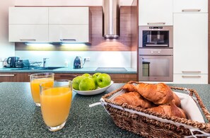 Deluxe Apartment, 2 Bedrooms, Balcony (Jáchymova 4) | Private kitchen | Full-sized fridge, microwave, oven, stovetop - Wishlist Old Prague Residences (Prague)