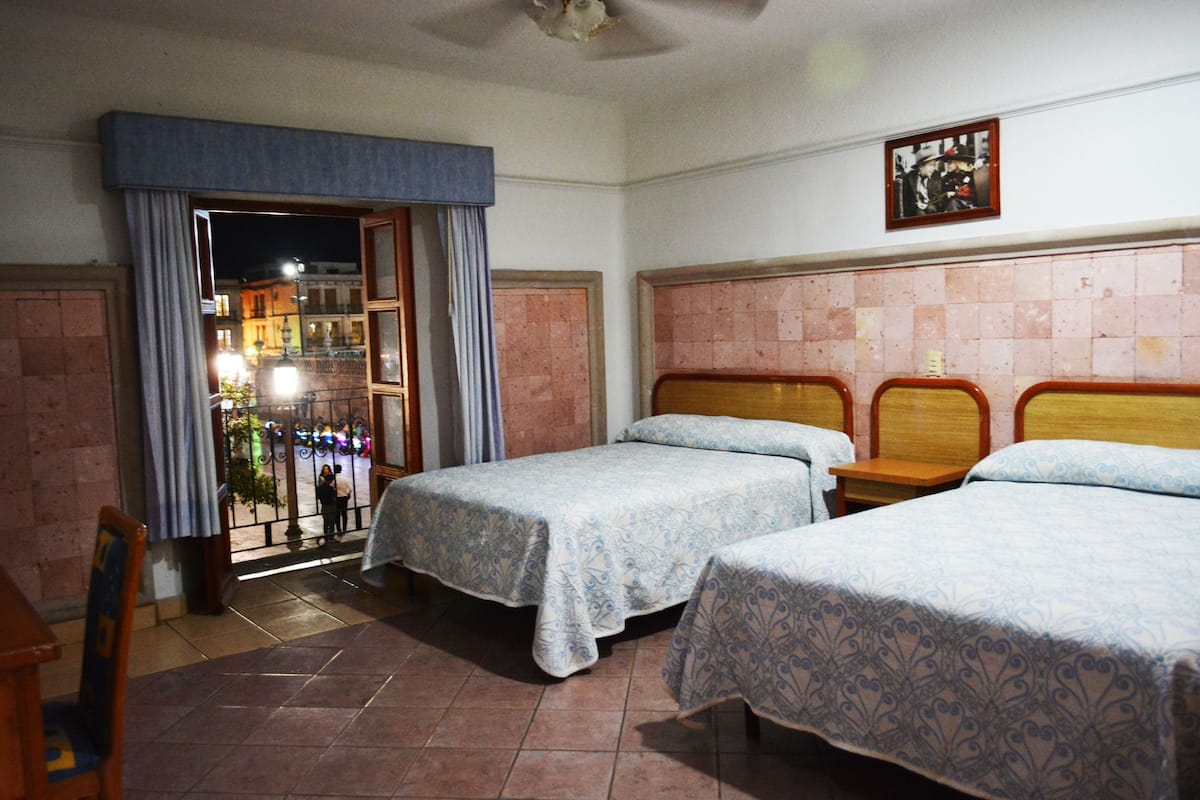 Room, Balcony (2 Double Beds and 1 Single Bed) | WiFi (free), bed sheets