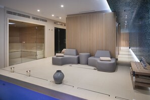 Indoor pool, open 7:00 AM to 10:00 PM, pool loungers