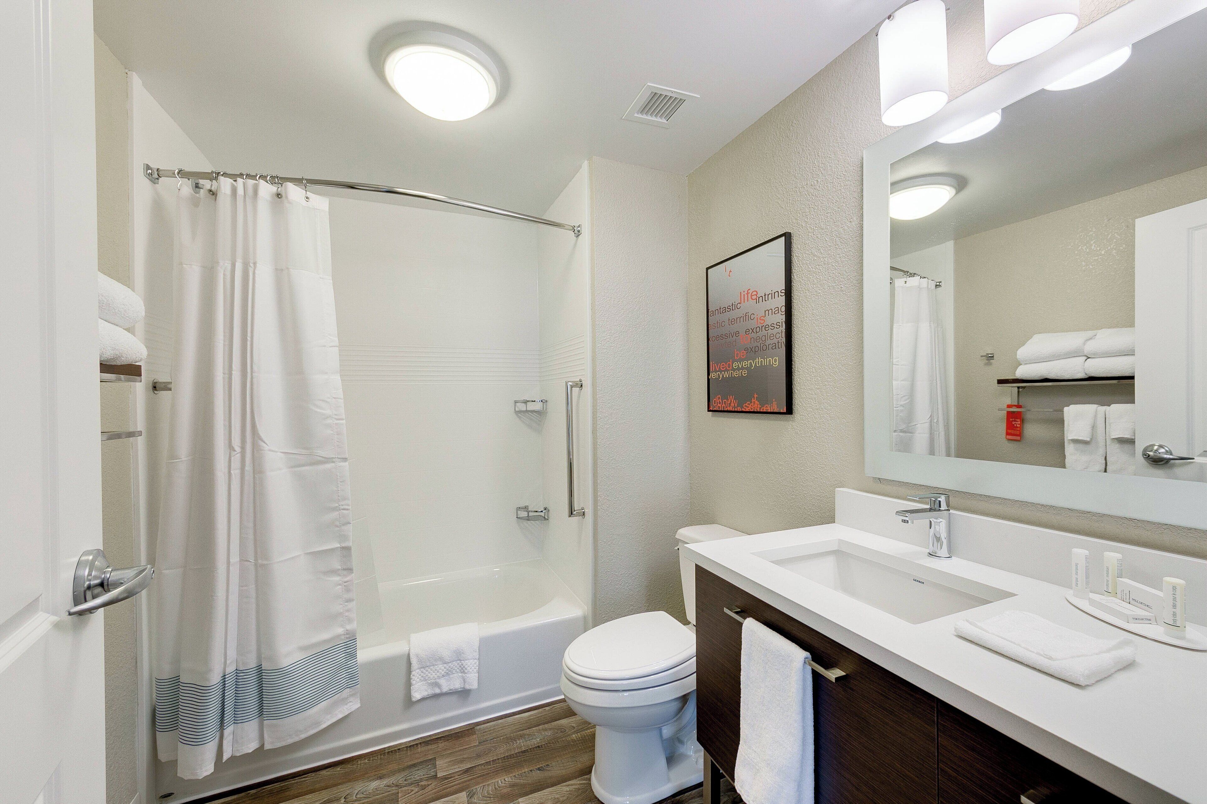 studio, 2 queen beds | bathroom | free toiletries, hair dryer, towels