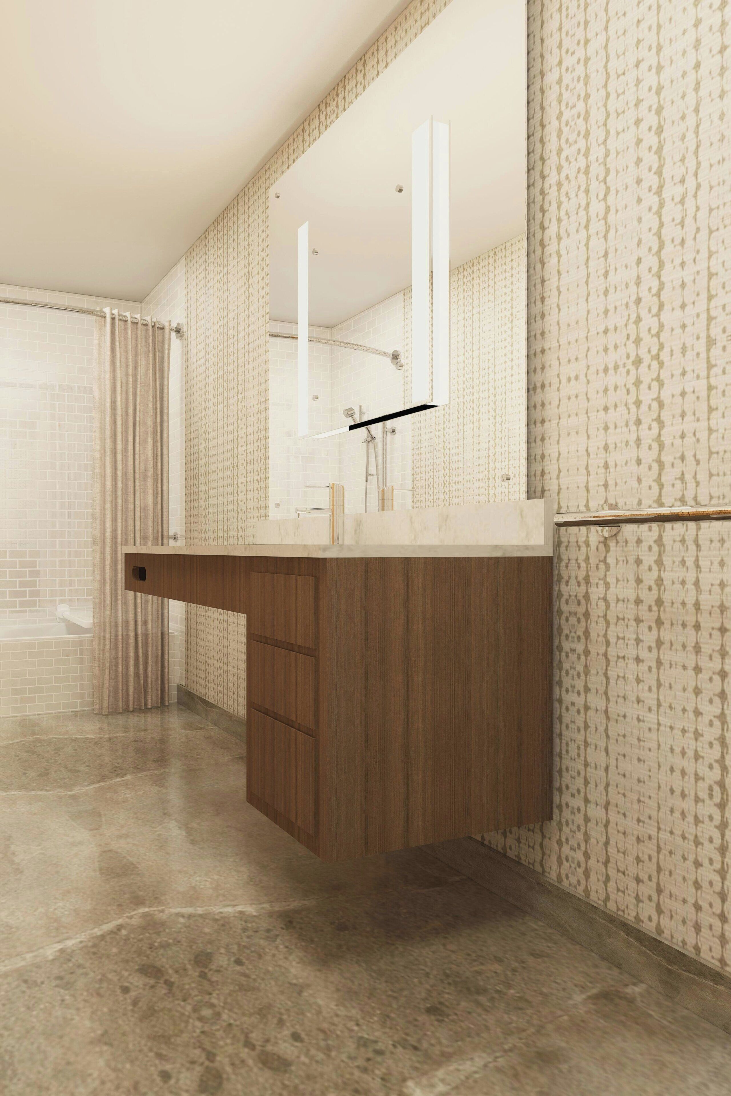 A modern bathroom with a wooden vanity, a large mirror, and patterned wallpaper.