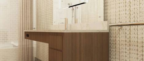 A modern bathroom with a wooden vanity, a large mirror, and patterned wallpaper.