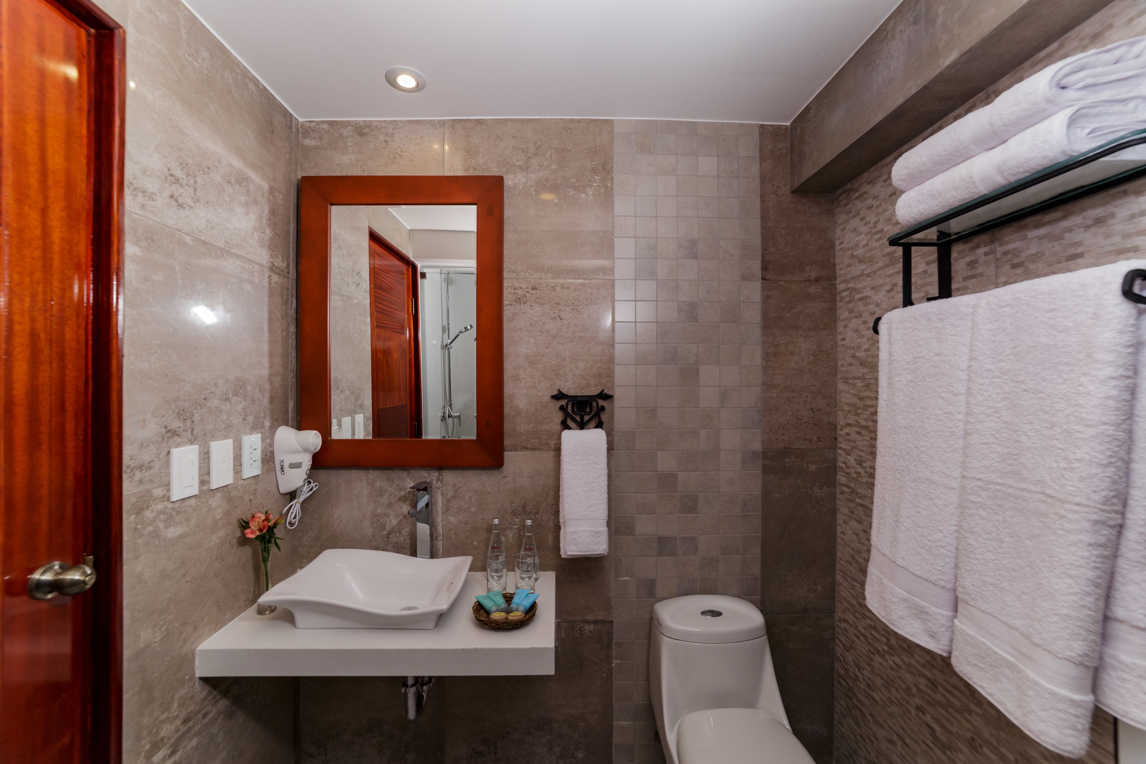 superior triple room | bathroom | shower, rainfall showerhead, free toiletries, hair dryer