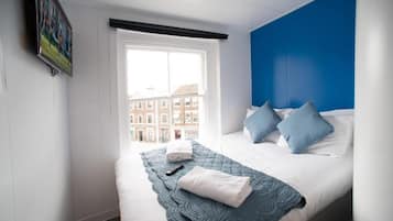 Een strijkplank/strijkijzer, gratis wifi, beddengoed