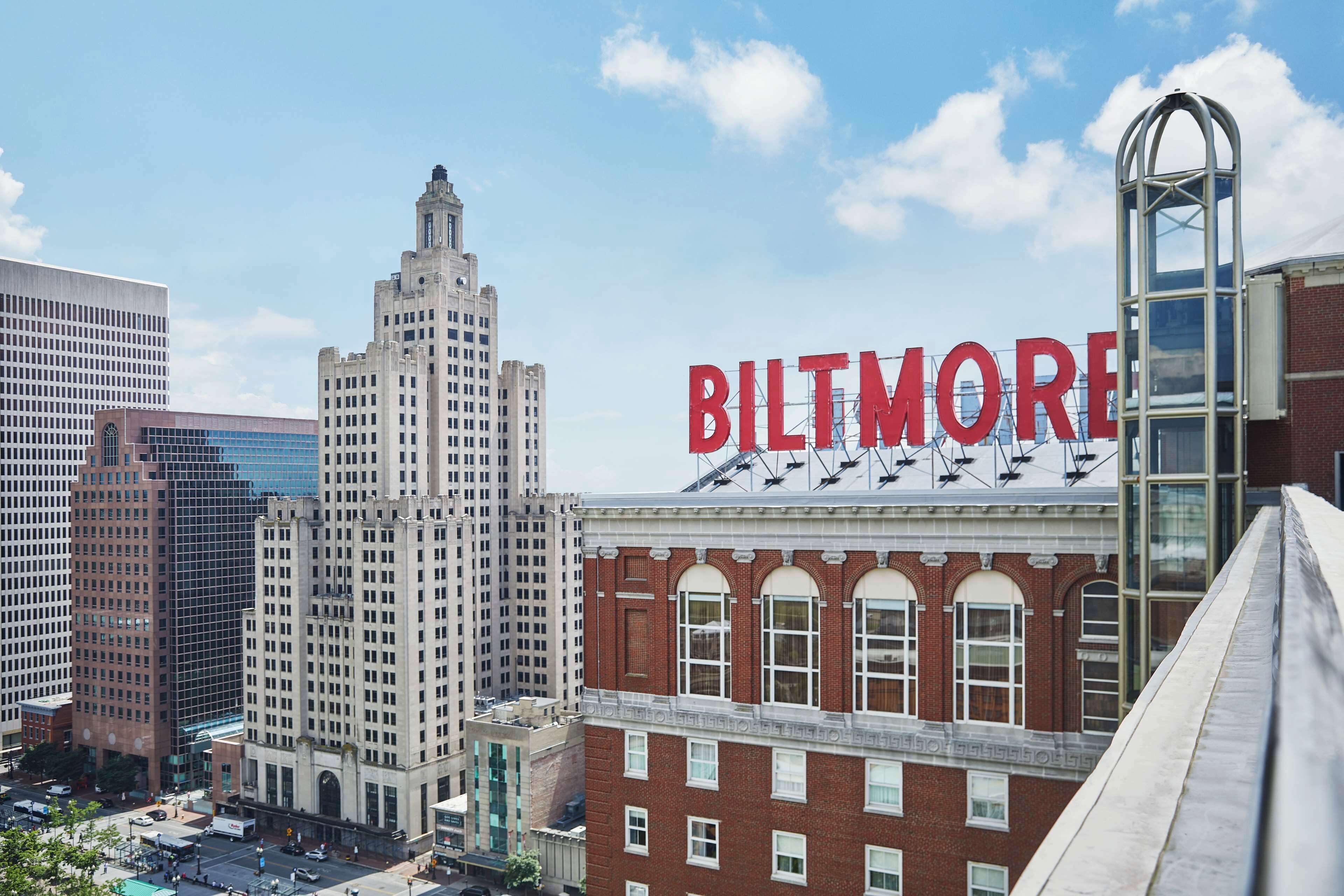 A cityscape with a prominent 'BALTIMORE' sign on a building.