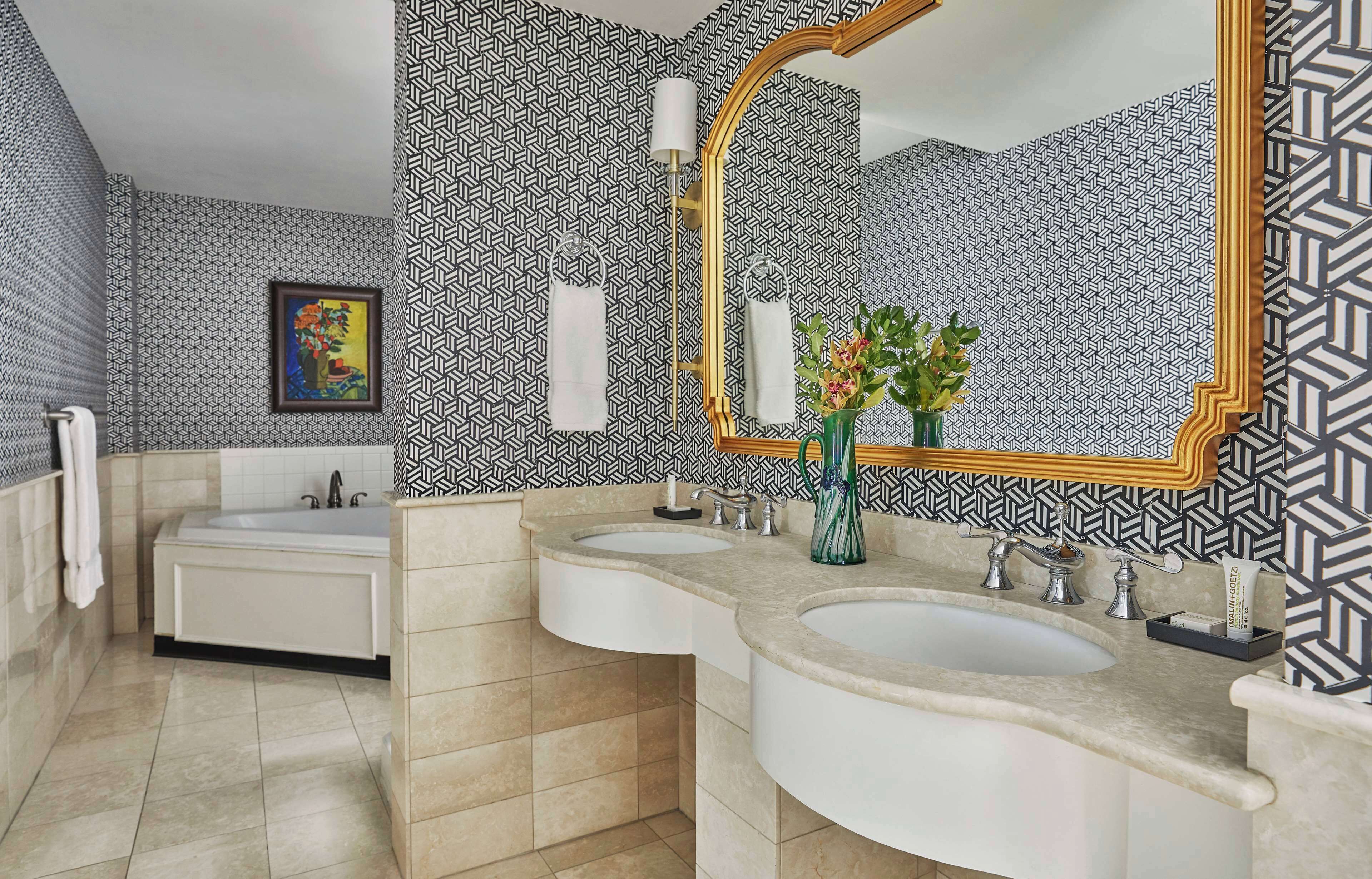 designer toiletries, hair dryer, towels, soap