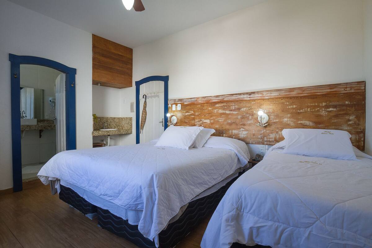 Luxury Triple Room | Minibar, desk, blackout drapes, iron/ironing board (on request)