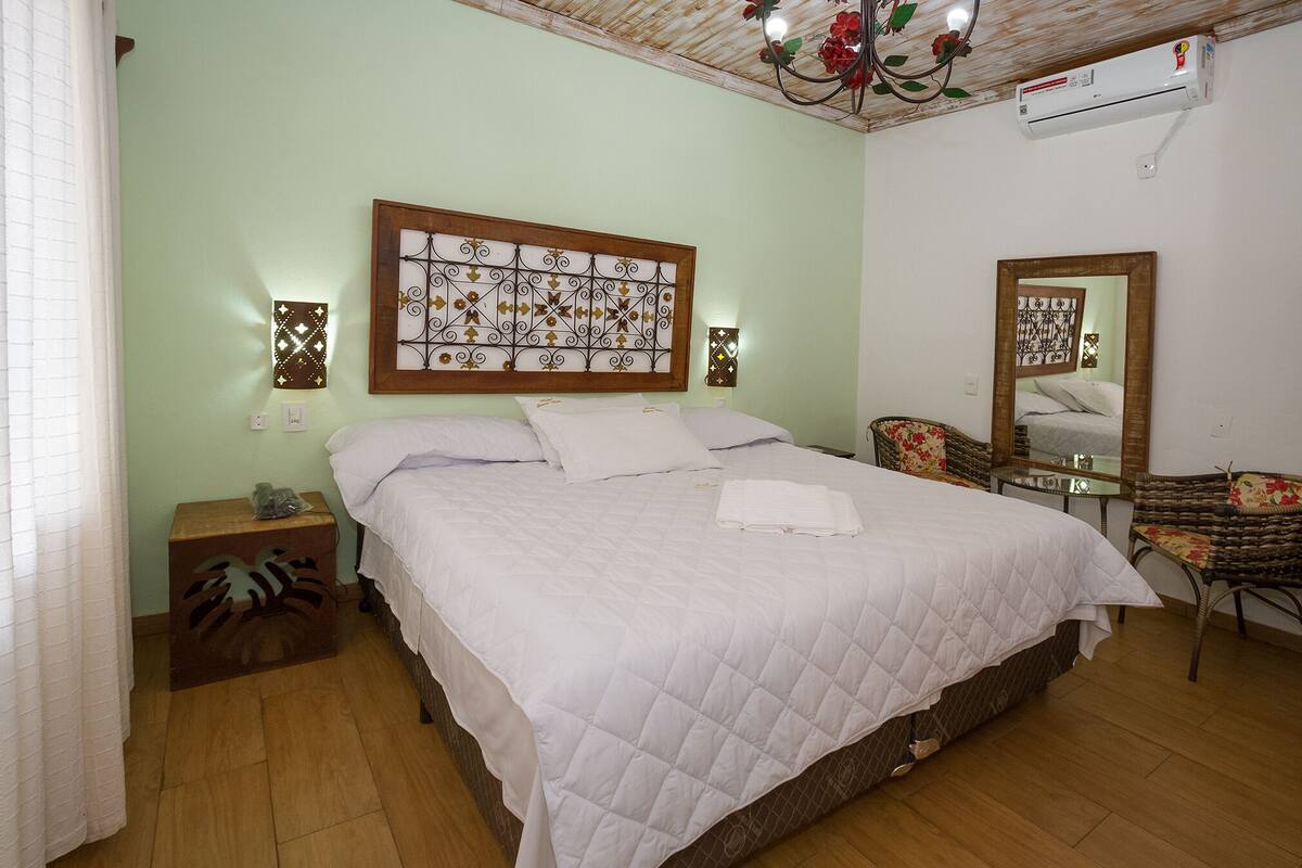 Deluxe Double Room | Minibar, desk, blackout drapes, iron/ironing board (on request)