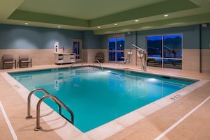 Indoor pool, open 10:00 AM to 10:00 PM, sun loungers