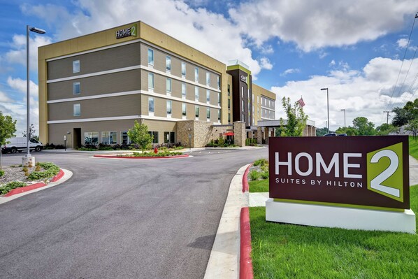 A modern hotel building with a sign reading "HOME 2 Suites by Hilton". - Home2 Suites by Hilton Springfield North (Springfield)