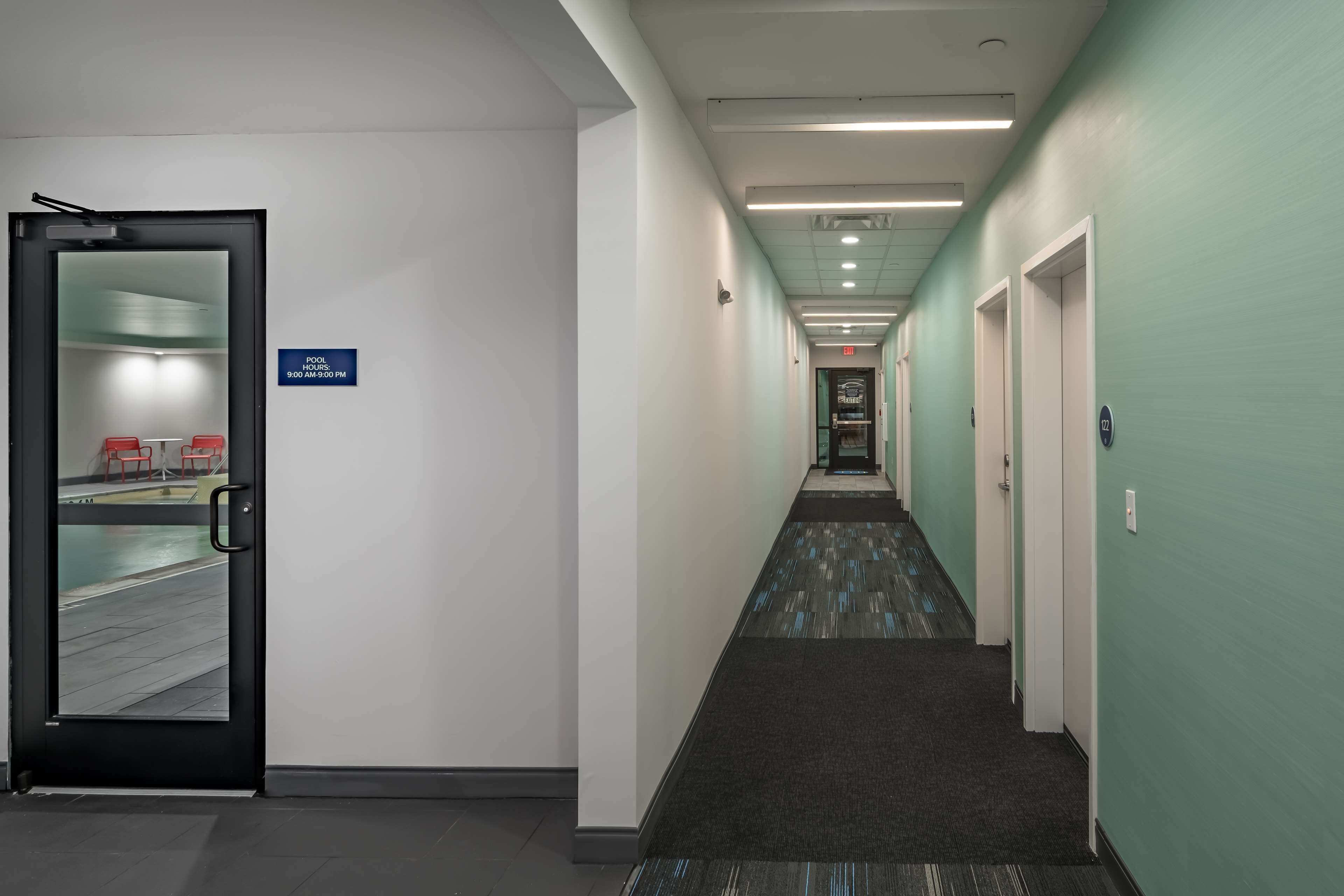 indoor pool, open 9:00 am to 9:00 pm, pool loungers